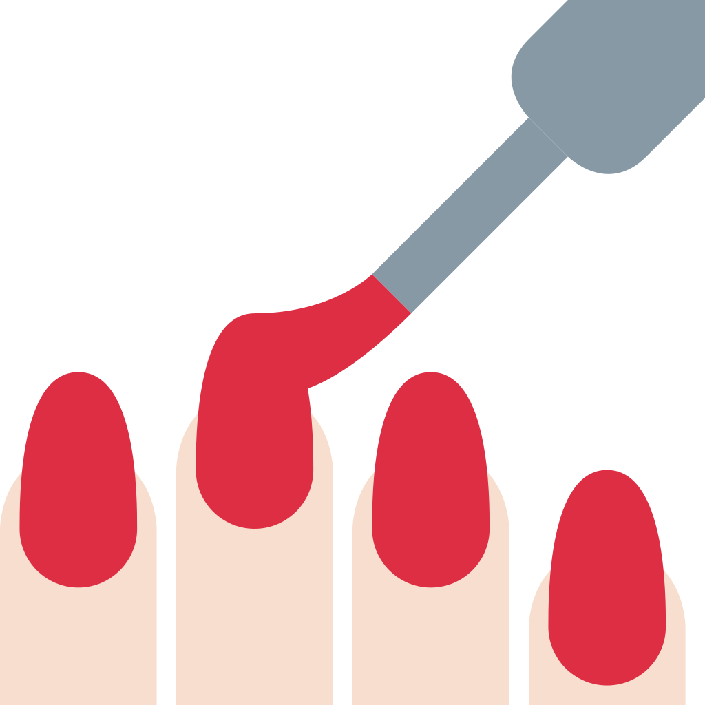 A nail polish bottle being used to paint red nails.
